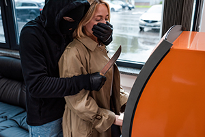 Robbery Man to Woman in ATM
